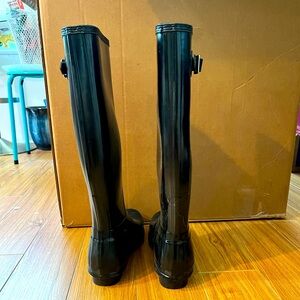 Tall black Hunter rain boots